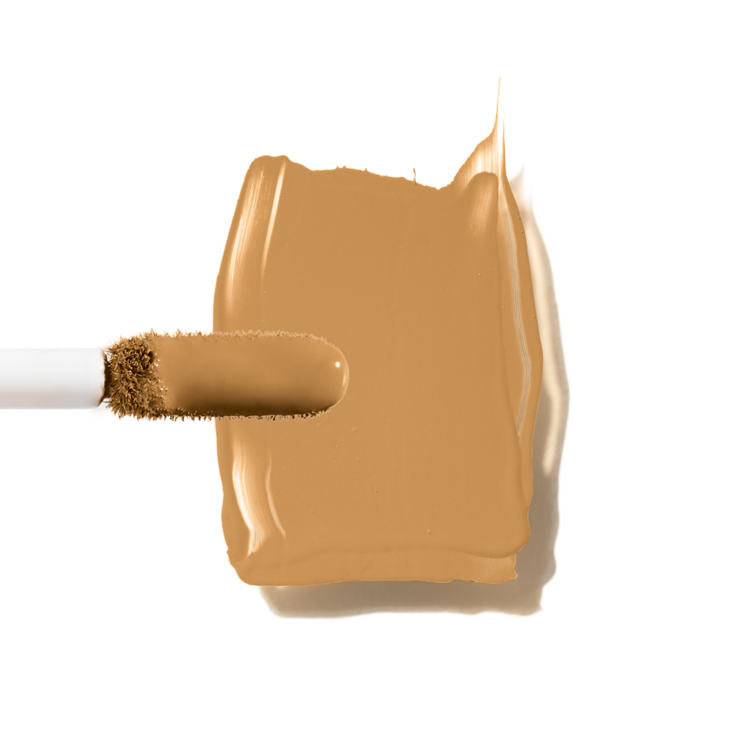 Maxine's Revenge French Face concealer shade Medium Deep Sand tube on a white background; blurring hydrating, stretchy foundation concealer for a natural radiant beautiful complexion