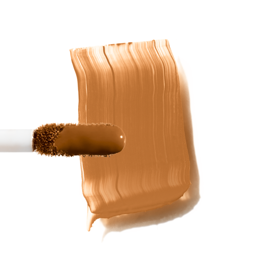 Maxine's Revenge French Face concealer shade Deep Chestnut tube on a white background; blurring hydrating, stretchy foundation concealer for a natural radiant beautiful complexion