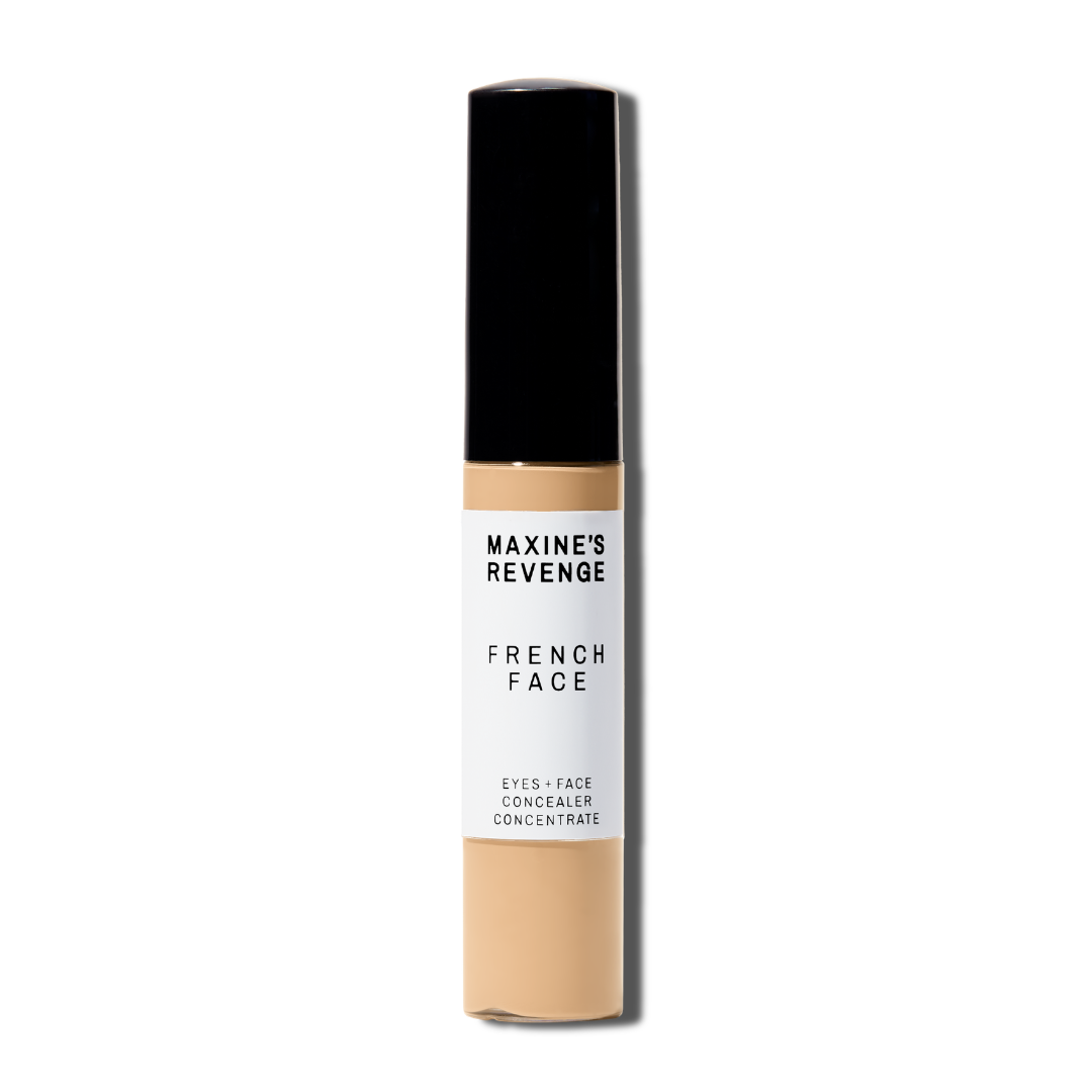 Maxine's Revenge French Face concealer shade Light Medium Beige tube on a white background; blurring hydrating, stretchy foundation concealer for a natural radiant beautiful complexion